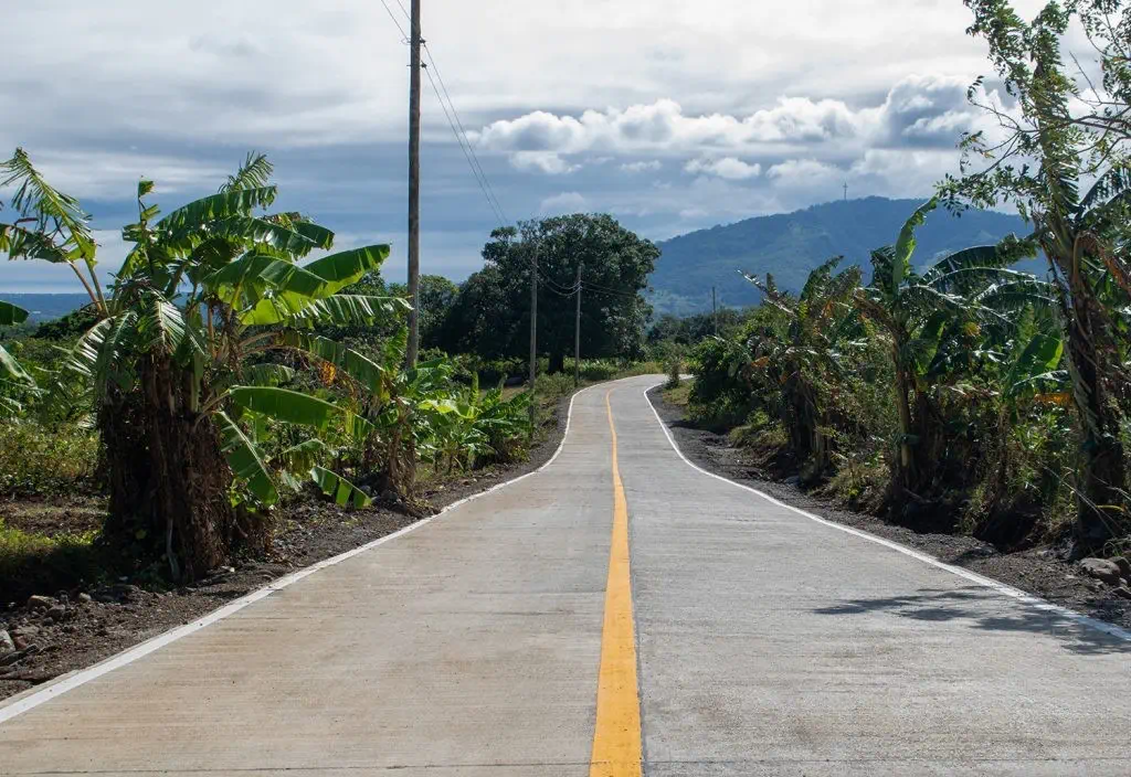 Bagac-Mariveles Road winding through green Bataan hills