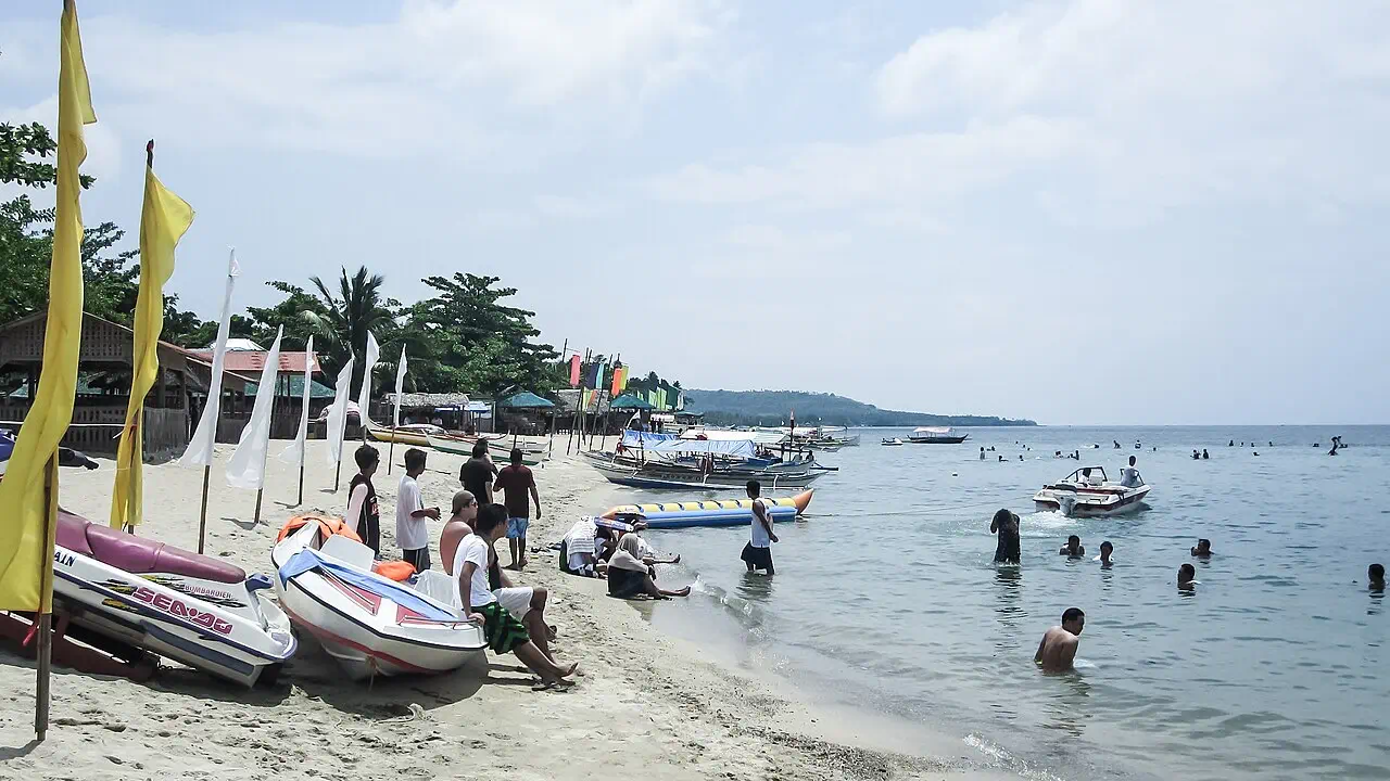 Morning beach activity at Laiya Beach in San Juan, Batangas